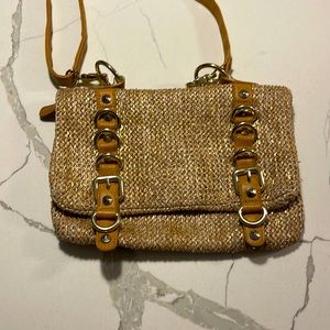 Straw and gold crossbody